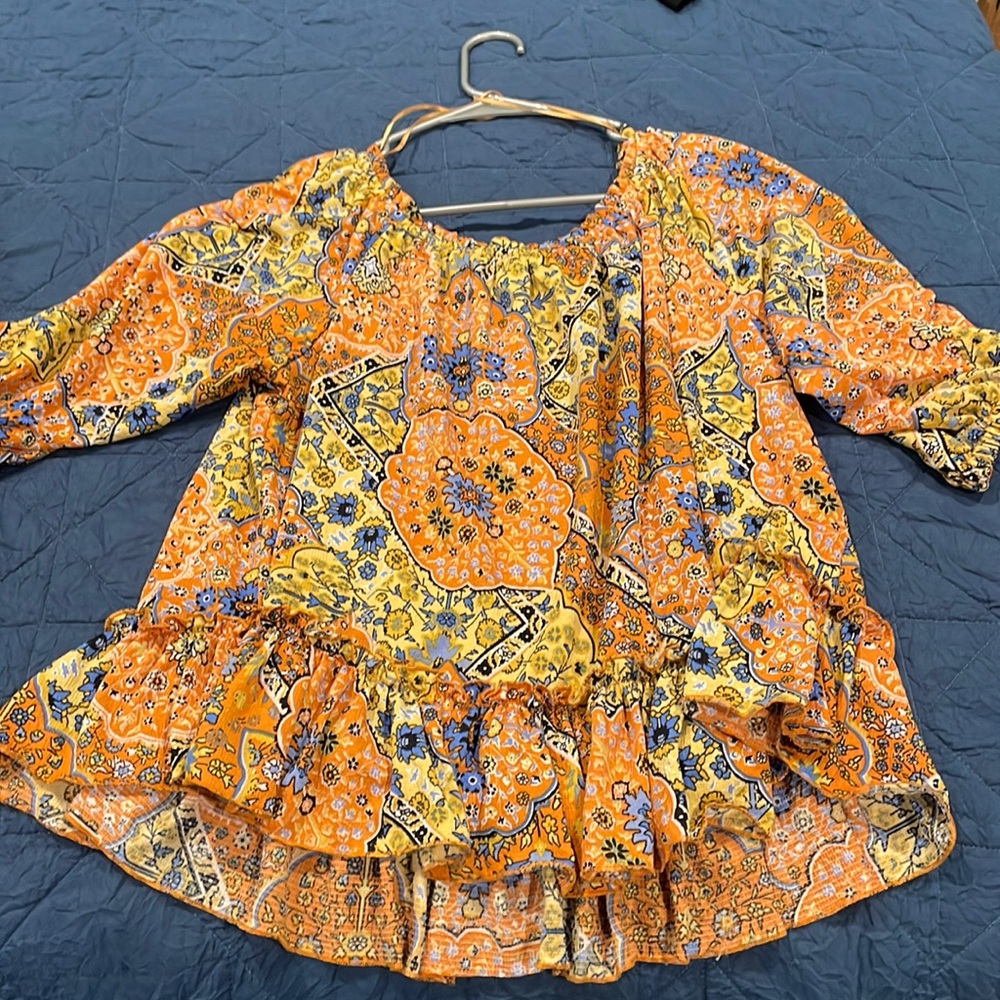 Multicolored blouse, looks good with jeans, worn like 2x, like new